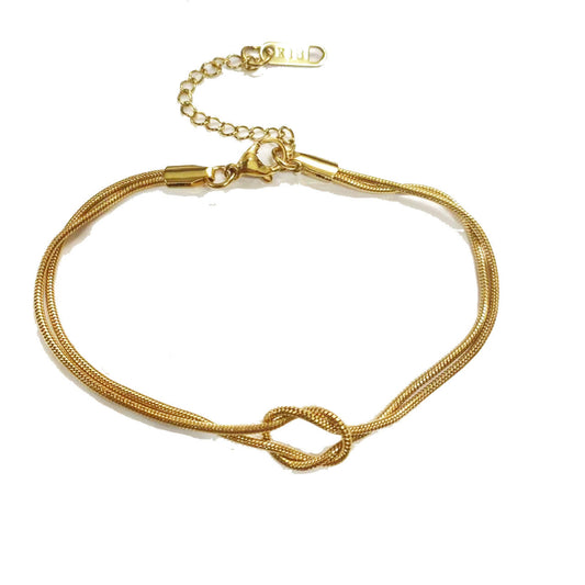 Pulsera con nudo dorada